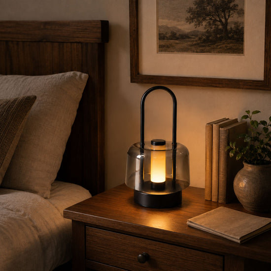 portable lantern-style ambient table lamp beside books and evening decor