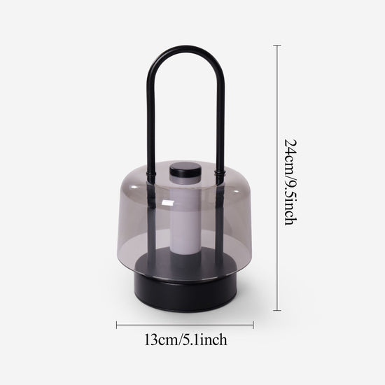 portable lantern-style ambient table lamp with a warm diffused glow