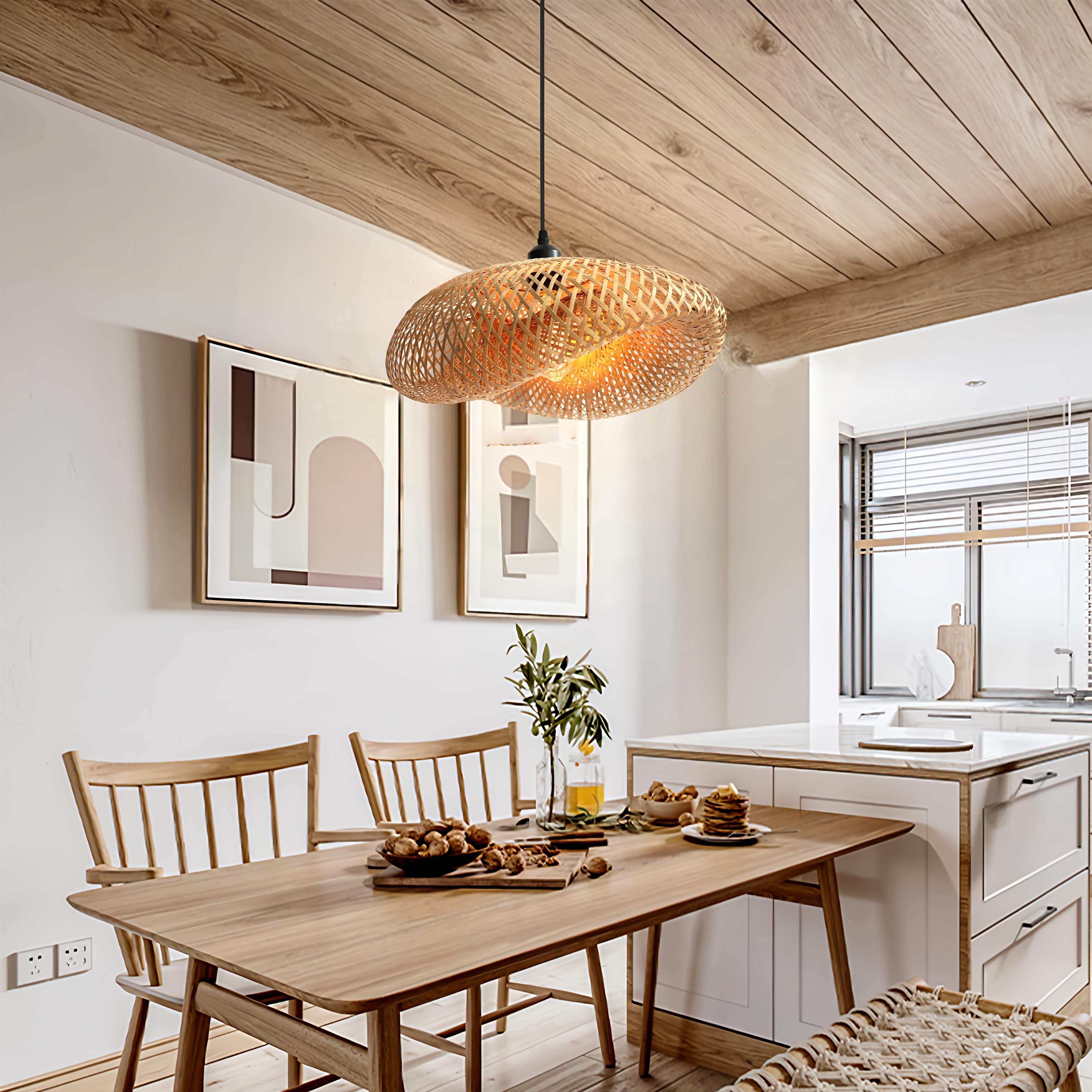 woven bamboo pendant light above a dining table beside the kitchen