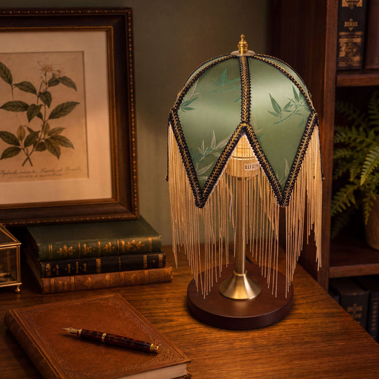 mid-century tassel table lamp shown as a clean product view