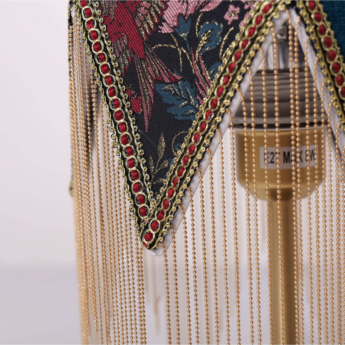 mid-century tassel table lamp shown as a clean product view