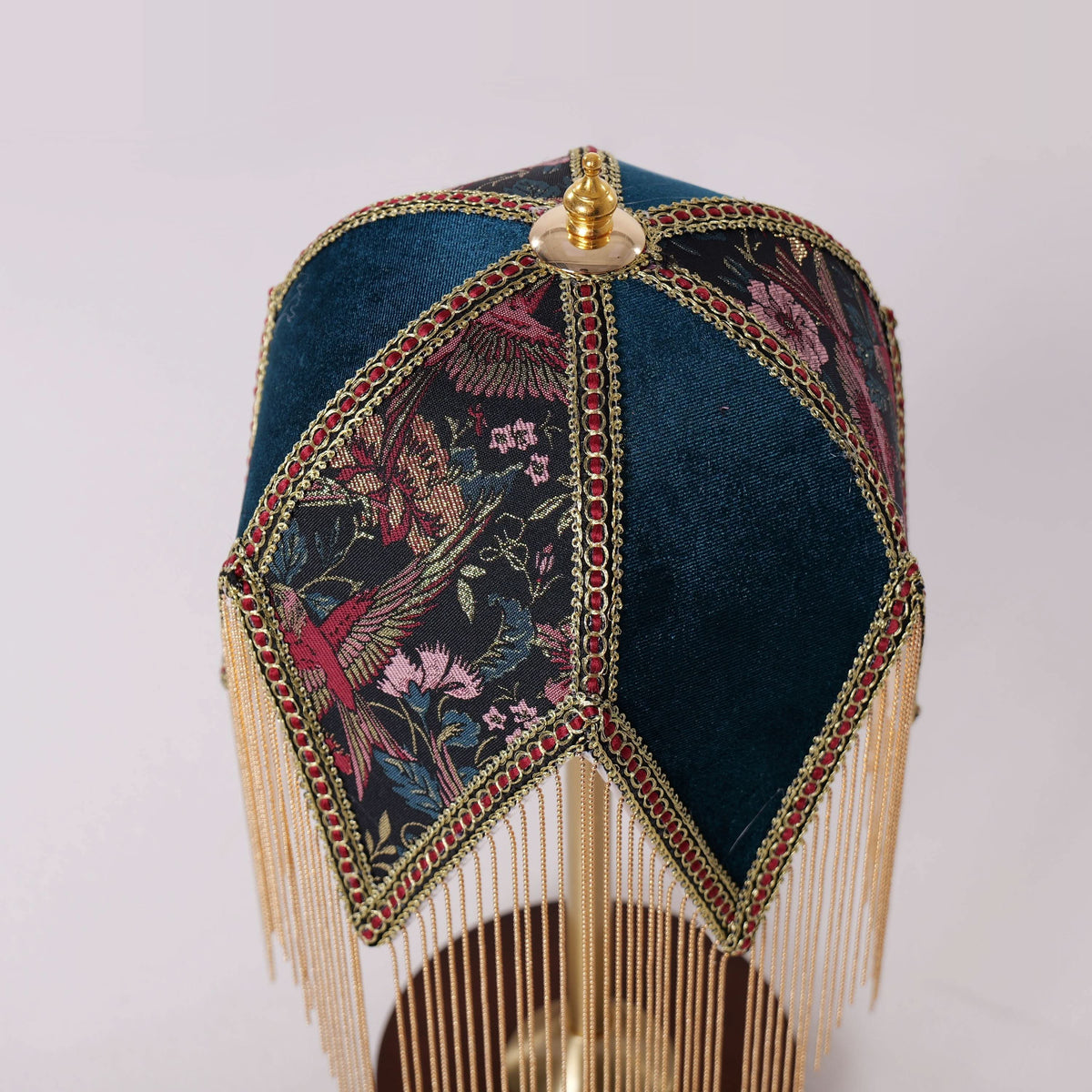 mid-century tassel table lamp on a desk with soft ambient light