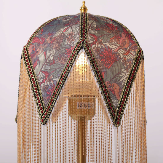 mid-century tassel table lamp with a warm diffused glow