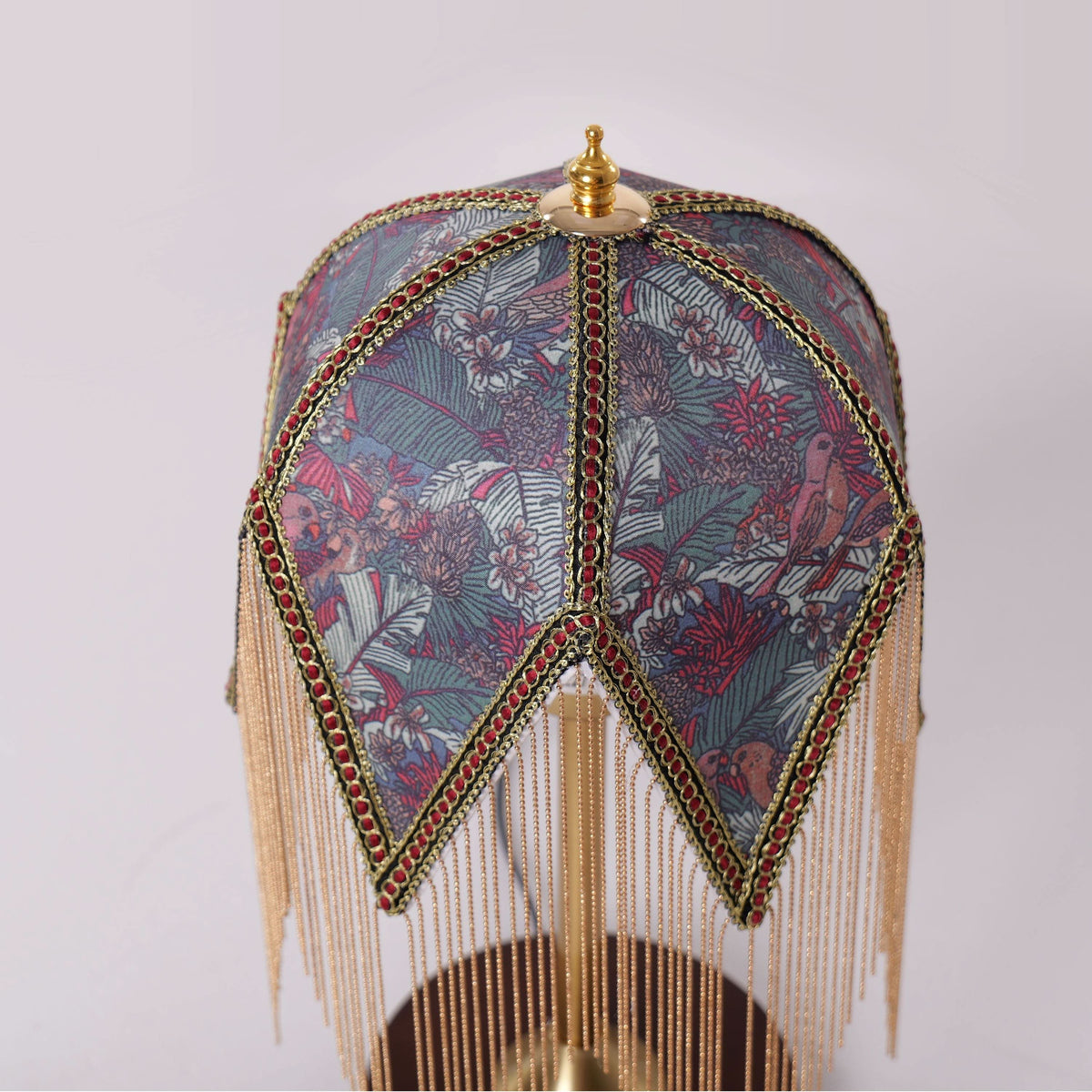 mid-century tassel table lamp styled on a small side table