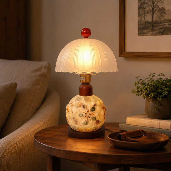 seashell mosaic table lamp shown as a clean product view