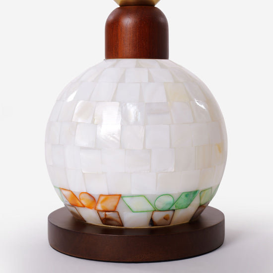 mother-of-pearl mosaic table lamp with a warm diffused glow
