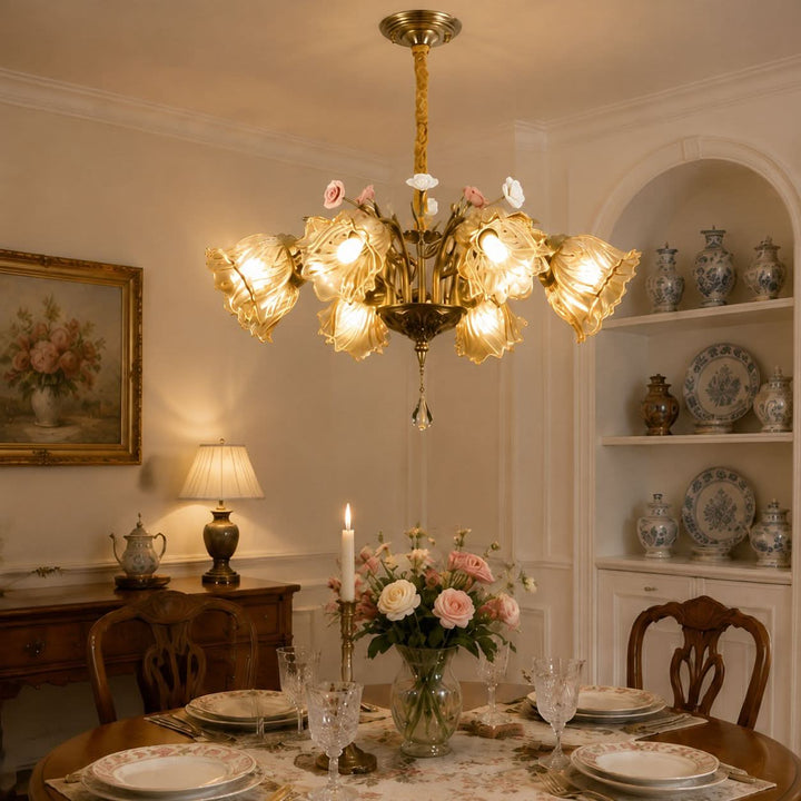 antique bronze chandelier with amber flower shades styled in a warm living room