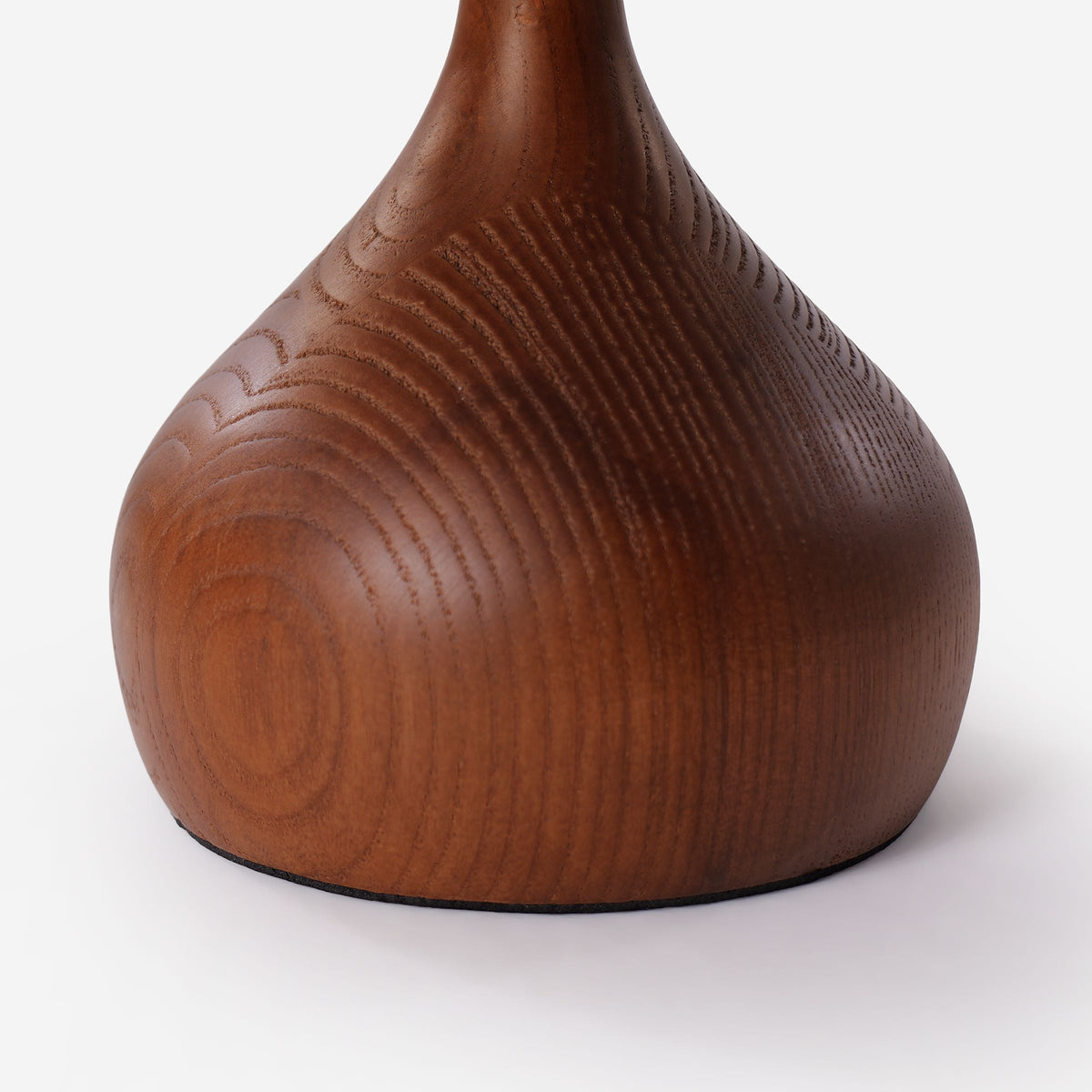 ash wood and glass table lamp with a warm diffused glow