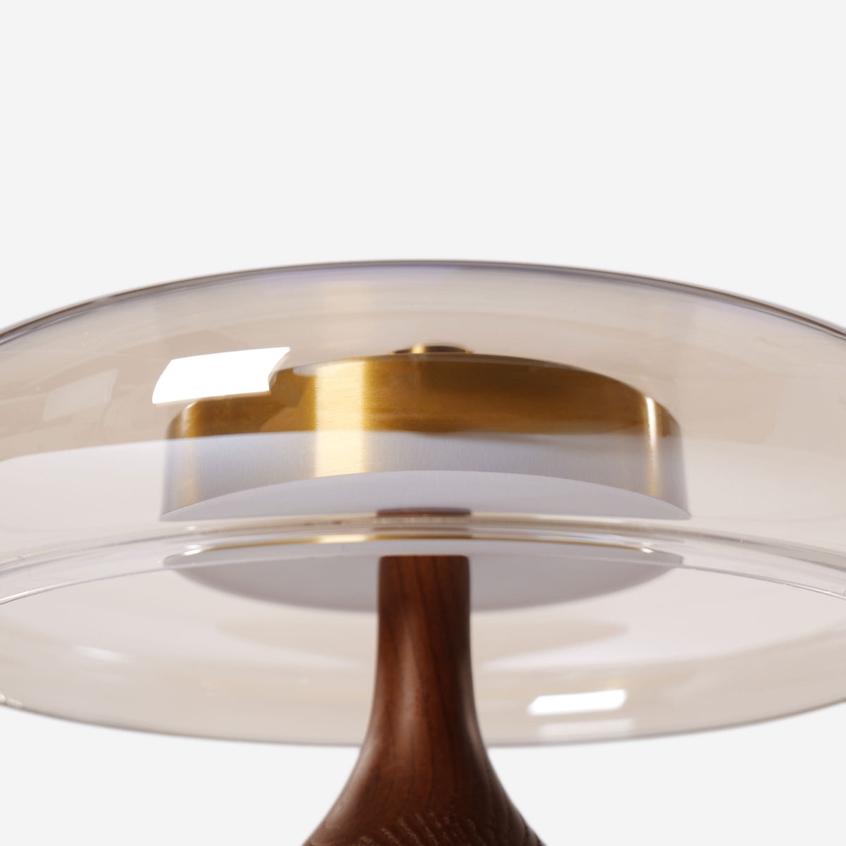 ash wood and glass table lamp styled on a small side table