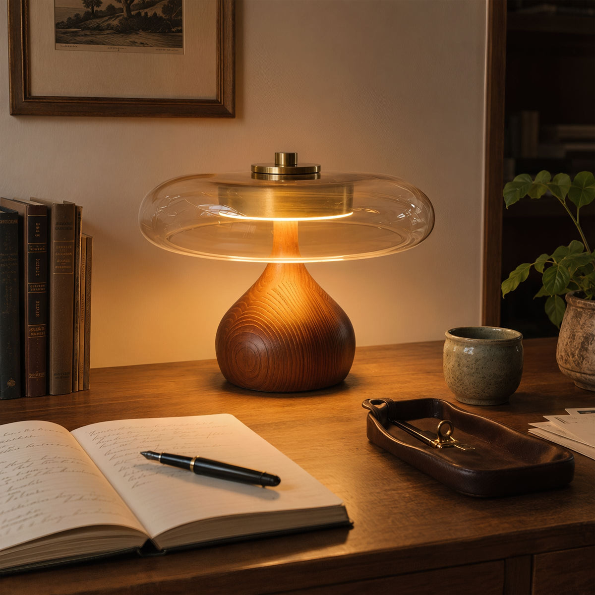 ash wood and glass table lamp on a desk with soft ambient light