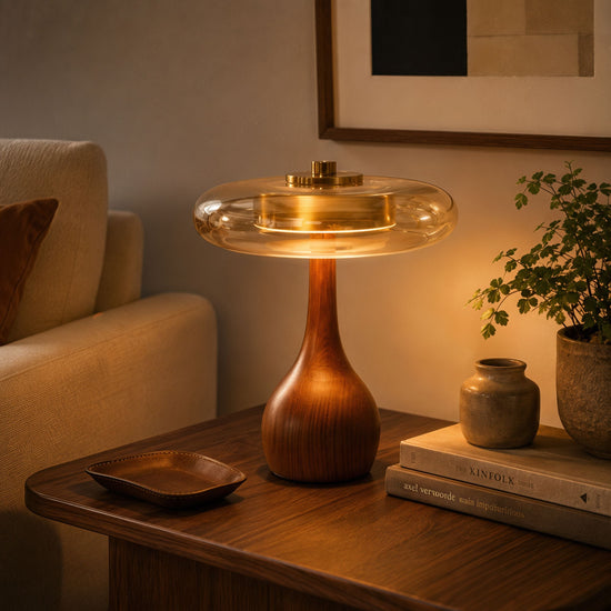 ash wood and glass table lamp on a desk with soft ambient light
