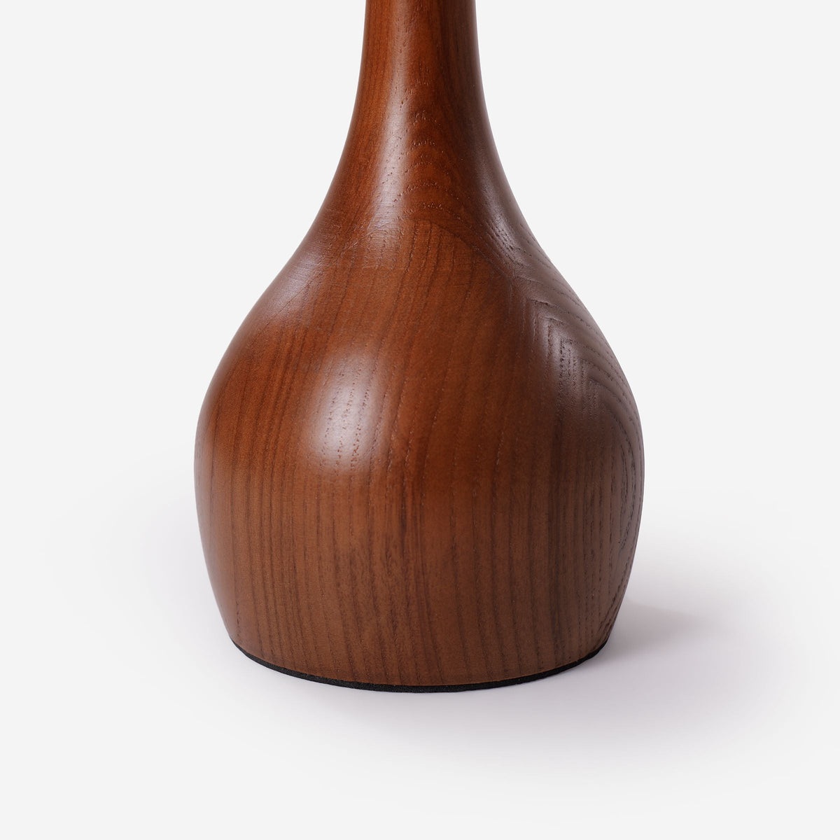 ash wood and glass table lamp with a warm diffused glow
