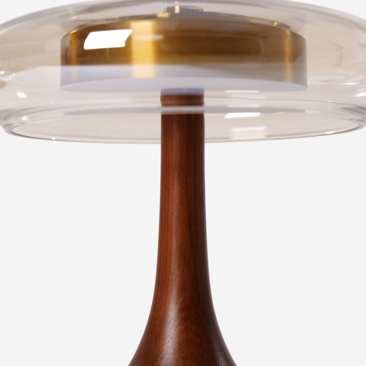 ash wood and glass table lamp styled on a small side table