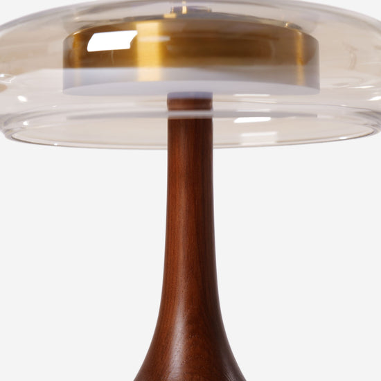 ash wood and glass table lamp styled on a small side table