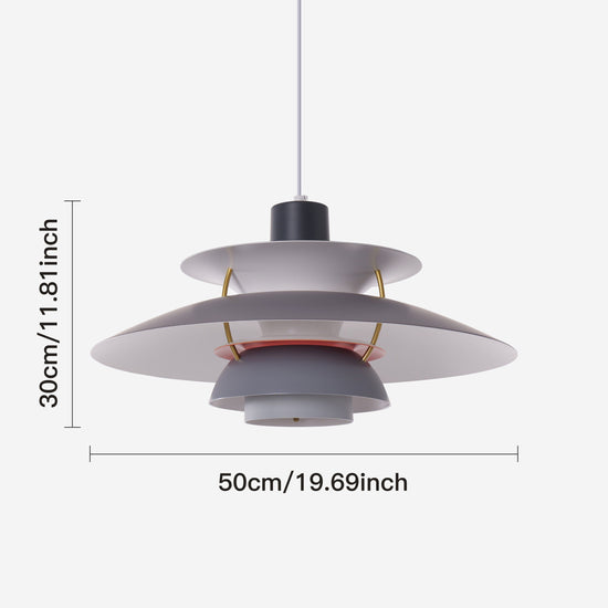 white layered minimalist pendant light beside a cosy seating area