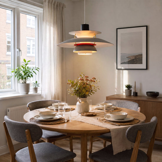 white layered minimalist pendant light styled in a calm bedroom