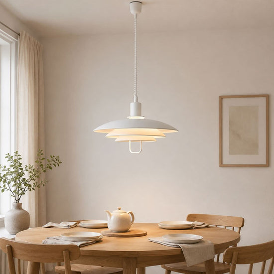 white layered minimalist pendant light in a warm living room