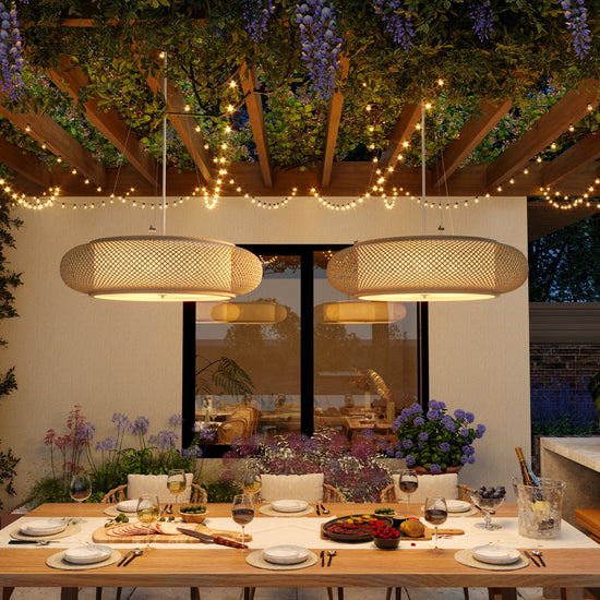 bamboo pendant lights above a covered patio dining table