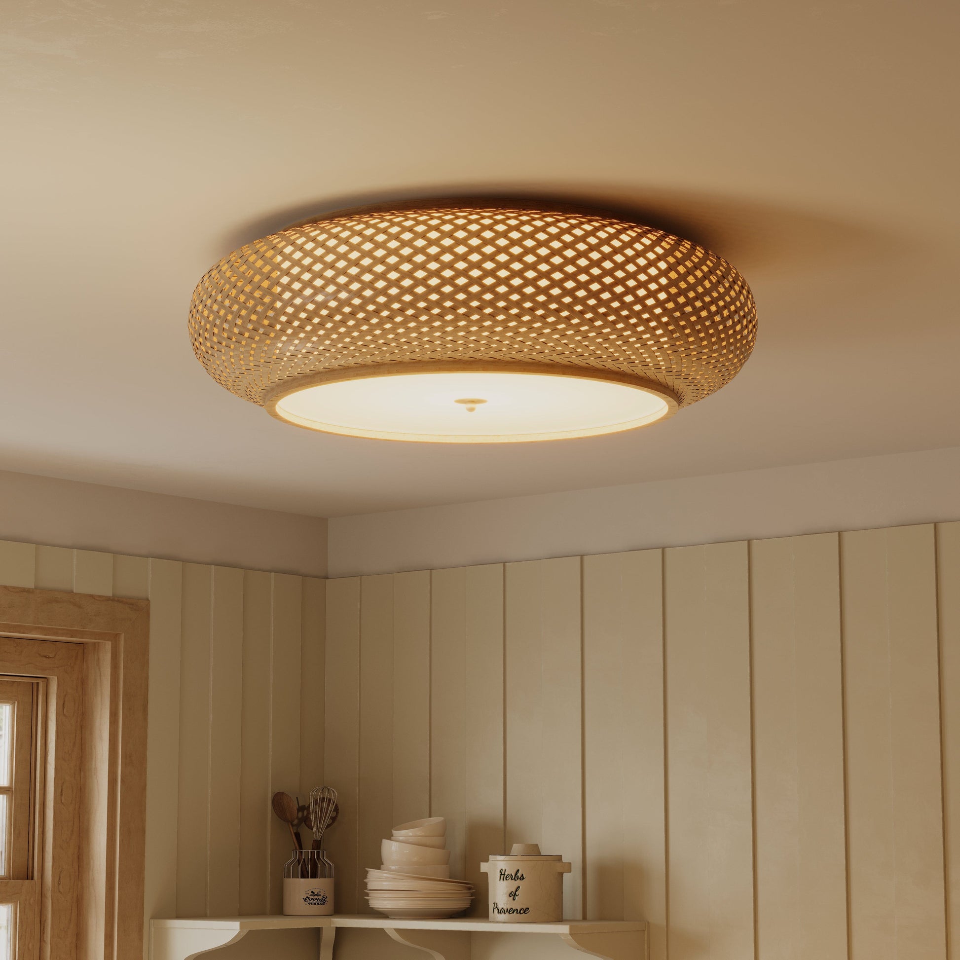 handwoven bamboo ceiling light glowing in a dining room