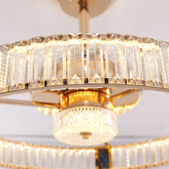 Gold crystal ceiling fan light detail showing frame, shade and fan blades