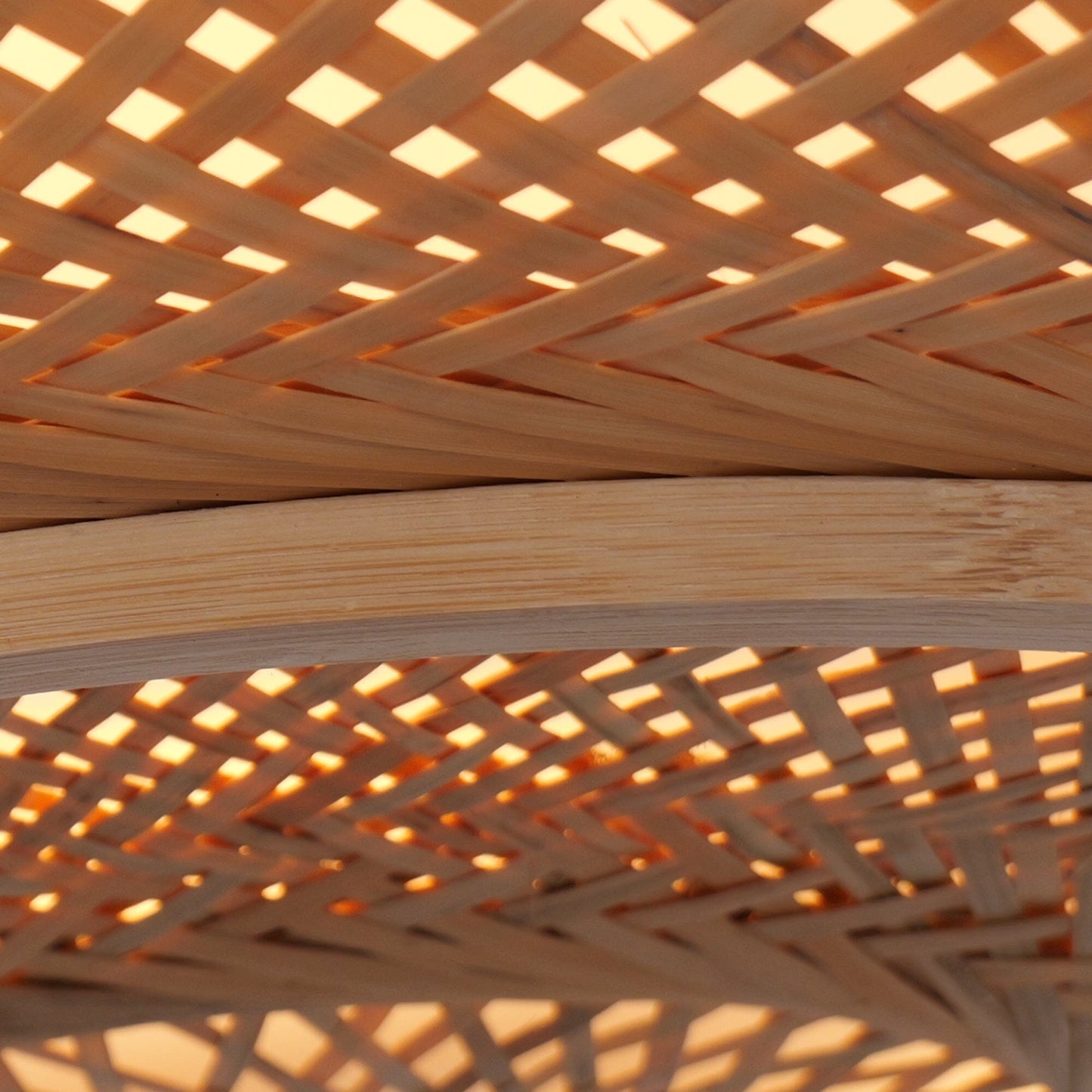 close-up of rattan weave with warm light glow