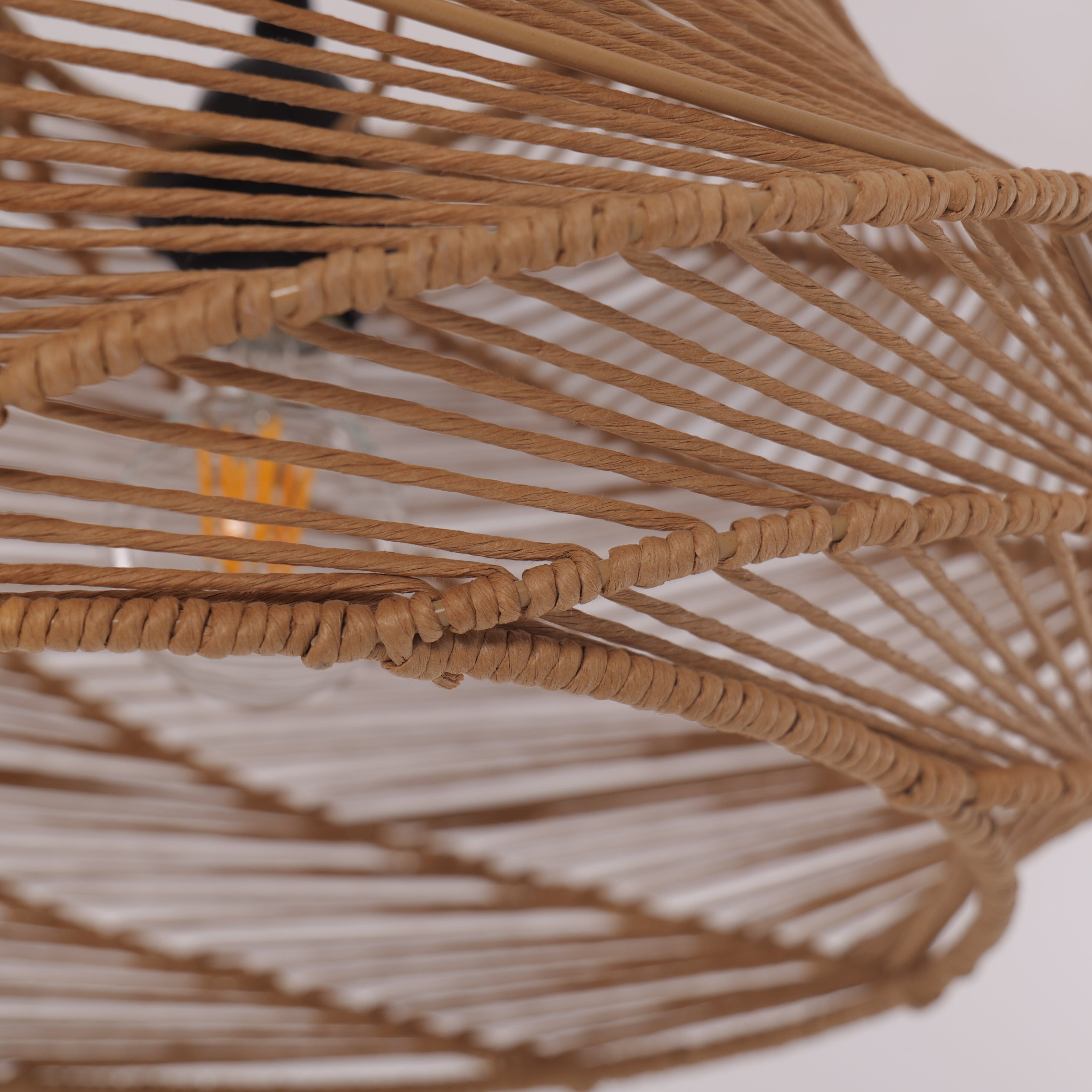 close-up of handwoven paper rope detail on the spiral pendant lampshade