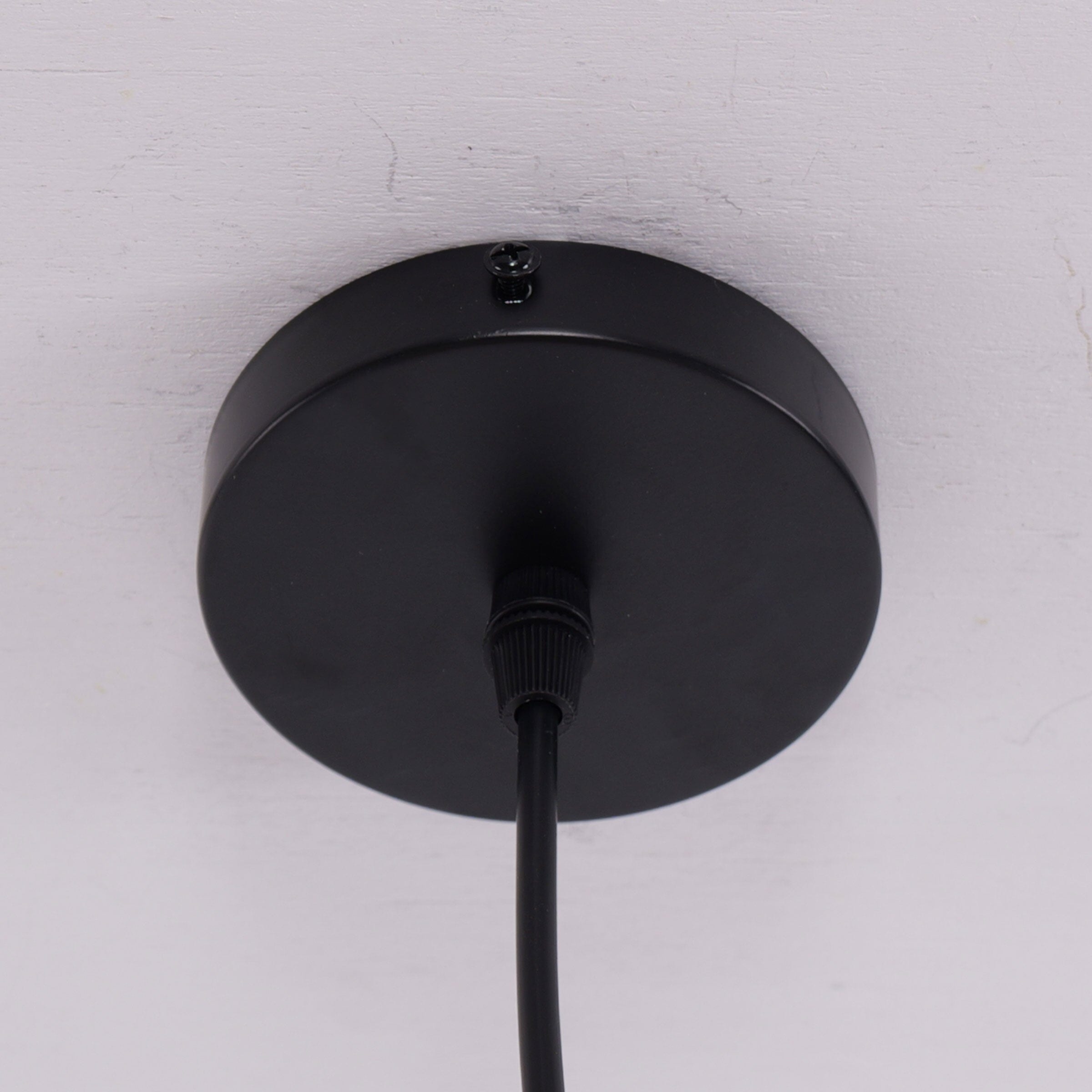 black ceiling plate and cord detail for bamboo pendant light