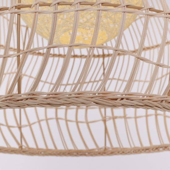 Close-up of handwoven rattan shade ribs and natural woven texture