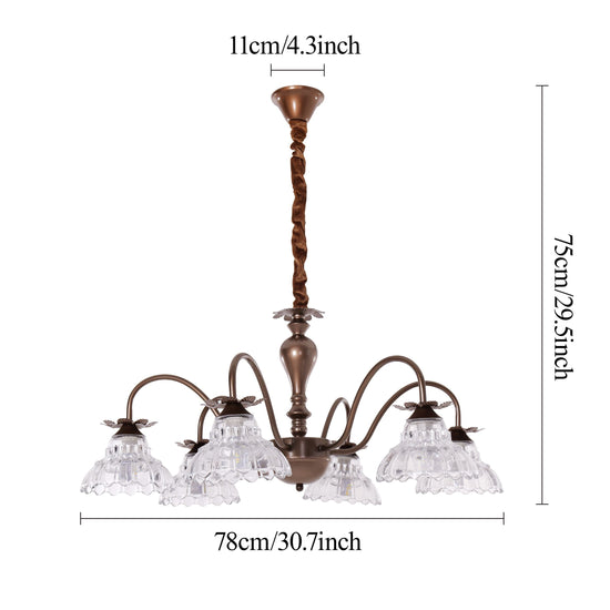 gold 6-light floral glass chandelier adding soft light to a bedroom