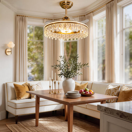 Modern gold crystal ceiling fan with light in warm home interior