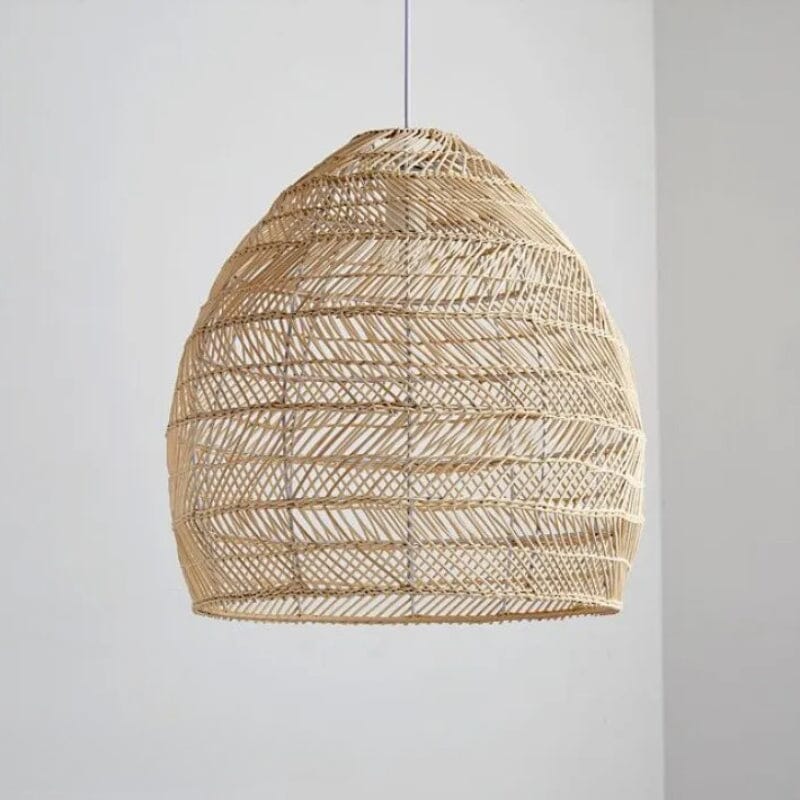 Unlit natural rattan pendant shade on a plain white background